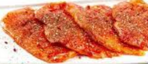 Kip pepersteaks op schaal p/kg.